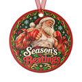 Funny metal Christmas ornament showing a muscular Santa in a tank top with red boxing hand wraps and the words "Season's Beatings"